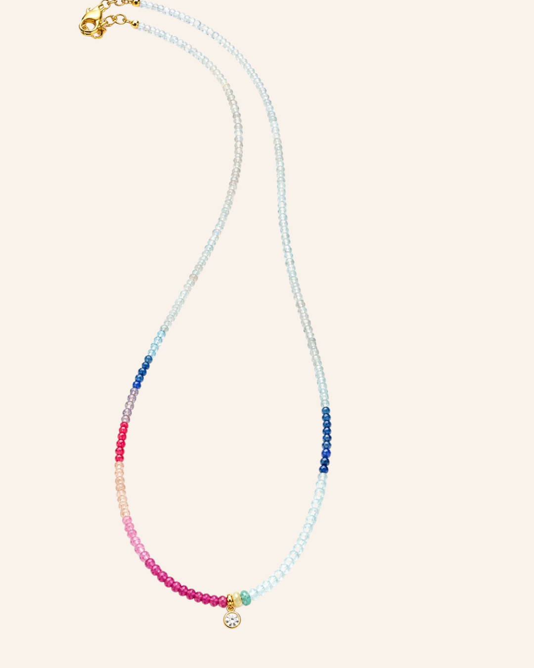 Port Scarlett Clio gemstone strand photographed on warm ivory
