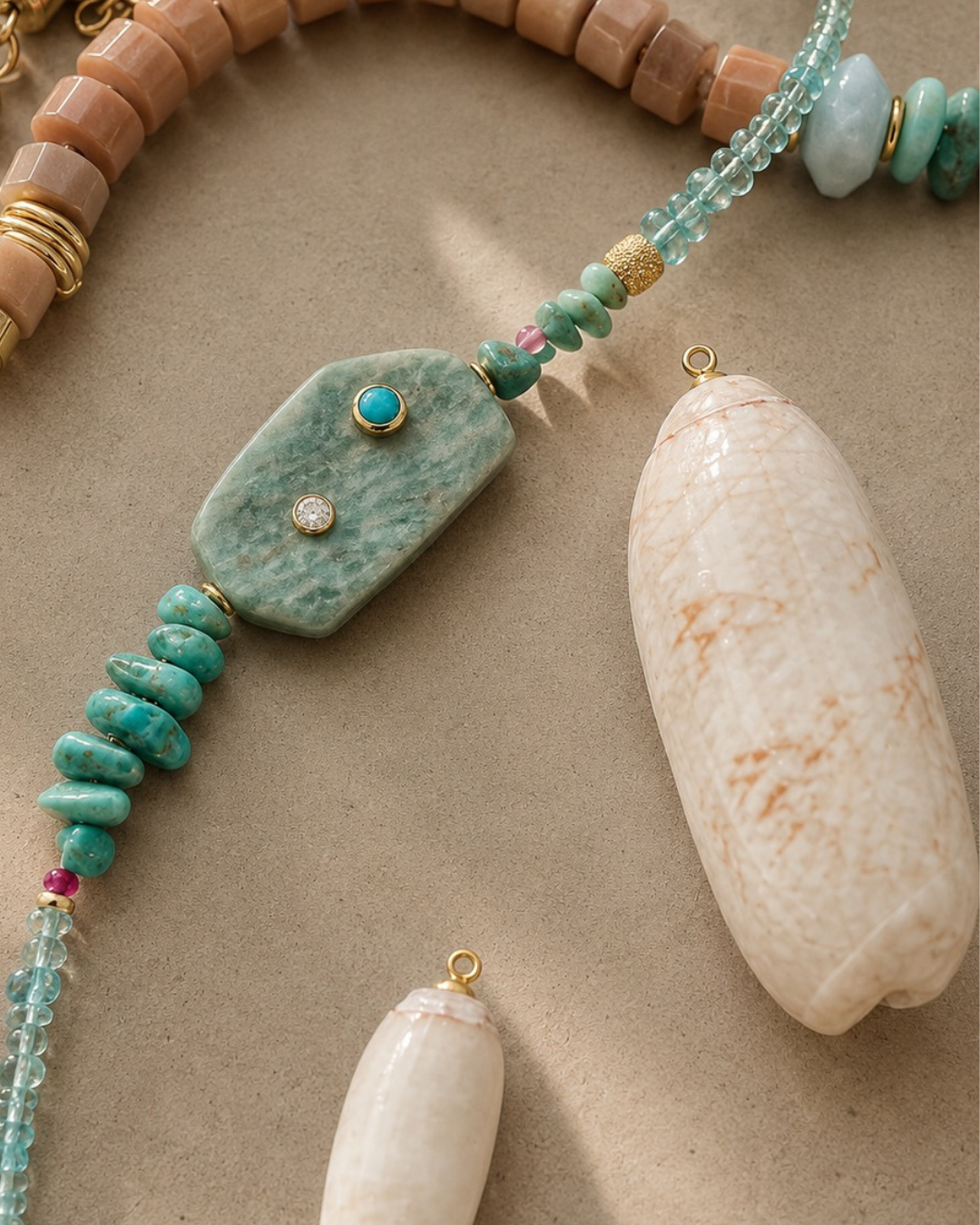 collection of necklaces and shells on table 