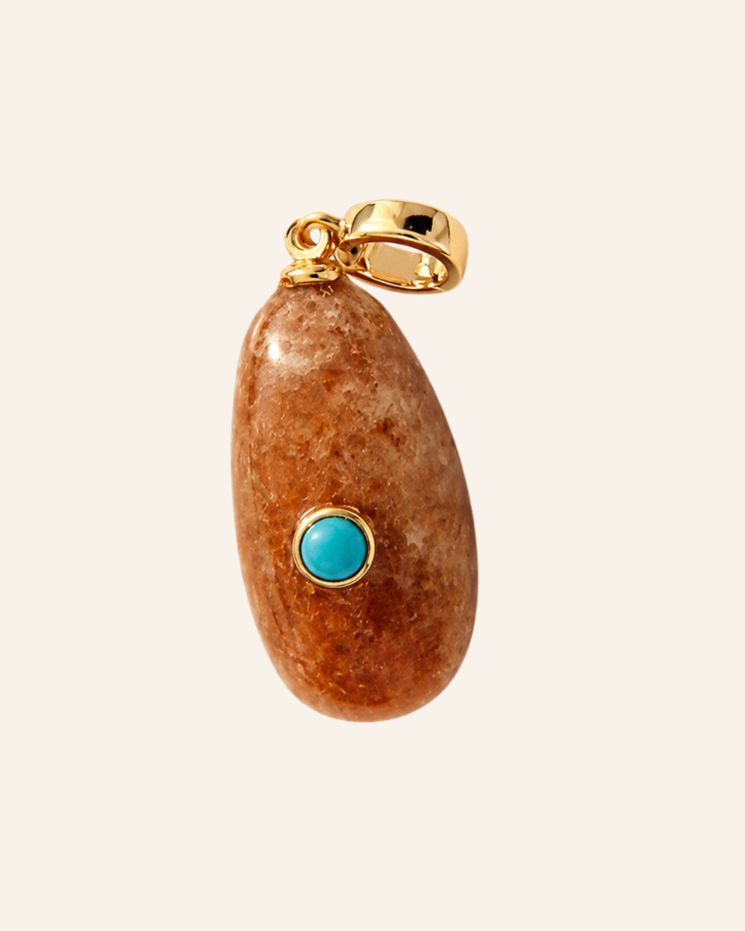 An oval pendant featuring a polished brown stone with natural marbling and a small round turquoise accent in a gold bezel setting, suspended from a gold bail, shown against a solid off-white background.