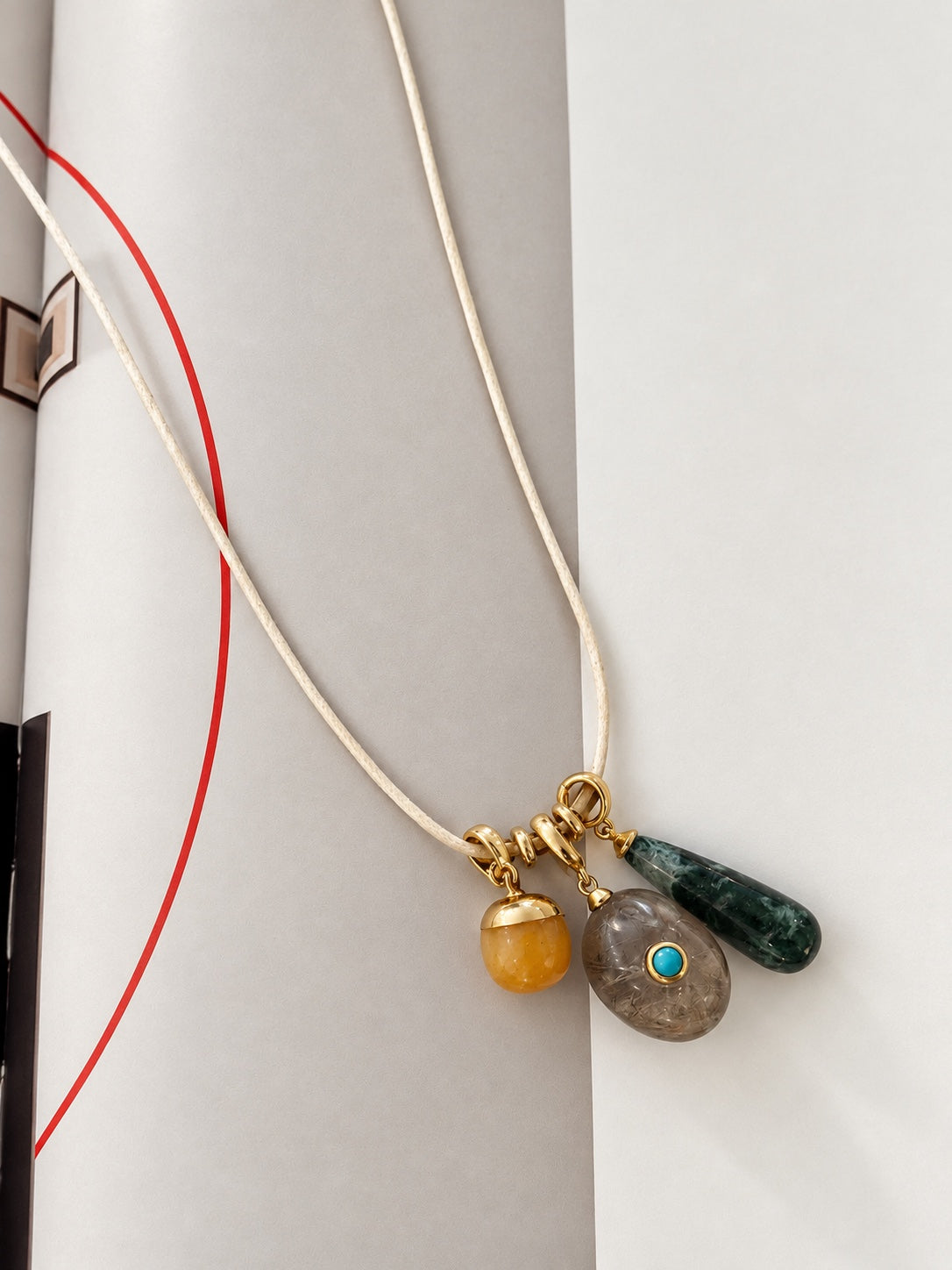 Elara smoky quartz Relic paired with other Relics on leather