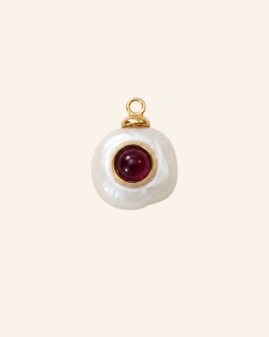 Nacre Relic No. 02, irregular white freshwater pearl with bezel-set pink tourmaline and gold-tone top loop