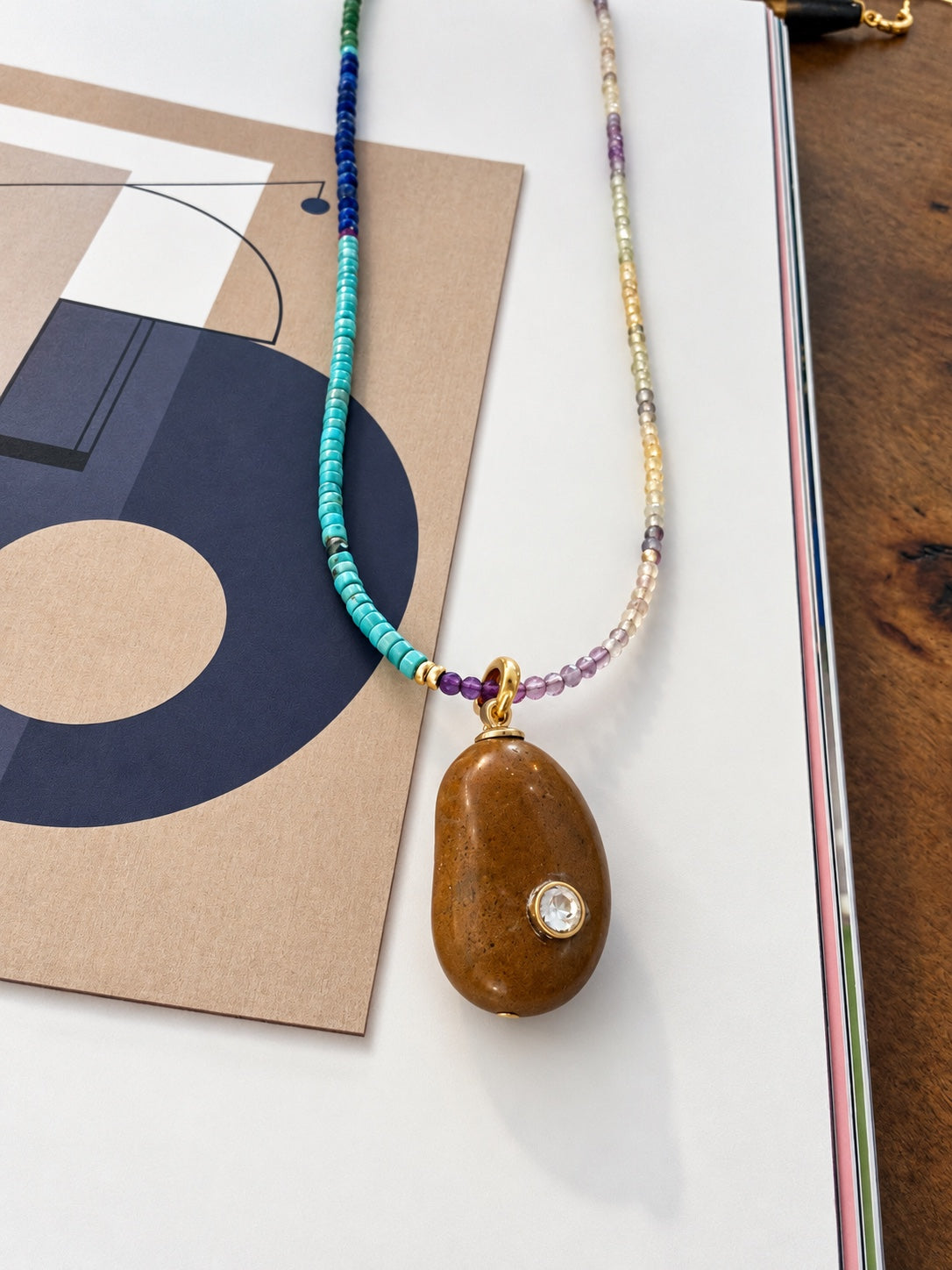 Orson yellow jasper Relic on a colorful gemstone strand
