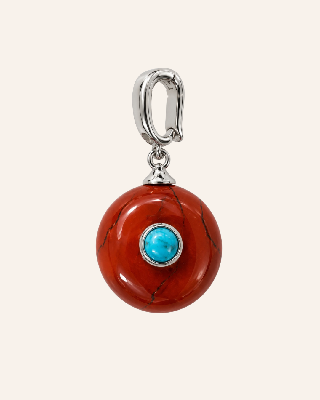 Sola Relic red jasper orb with turquoise inlay and silver-tone clasp on warm ivory background