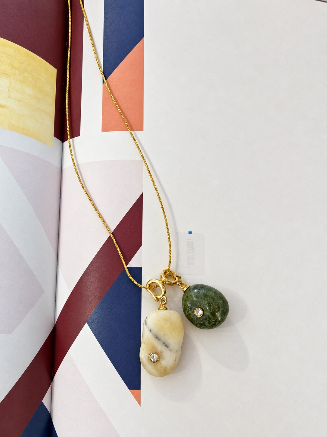 Verdant green jasper Relic paired with Lumen calcite Relic on gold chain